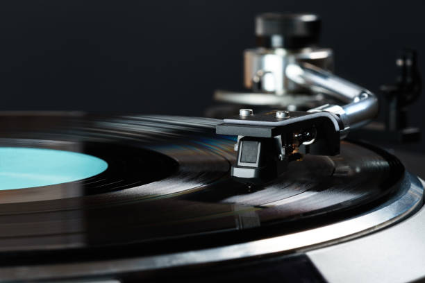 istock vintage turntable in action closeup 657007624