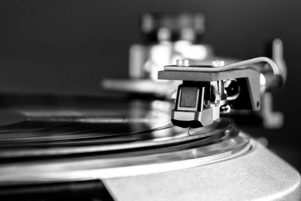 istock vintage turntable in action closeup black and white 657009838