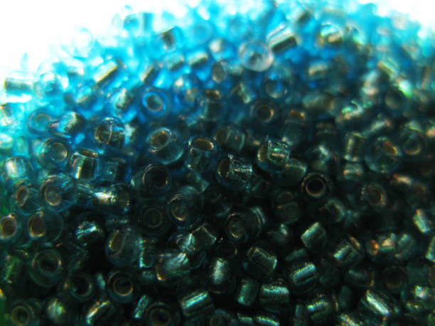 istock Blue turquoise glass beads background texture macro photo 657012988
