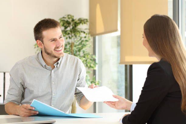 istock Man giving resume in a job interview 657015936