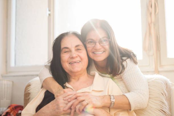 istock Smiling elderly woman and her daughter 657016122