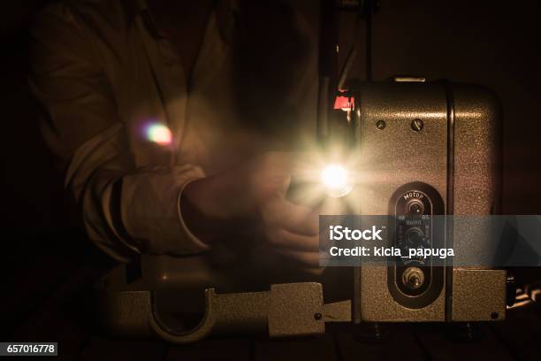 Man Watching Movie On Vintage Projector Stock Photo - Download Image Now - People, Watching, Front View