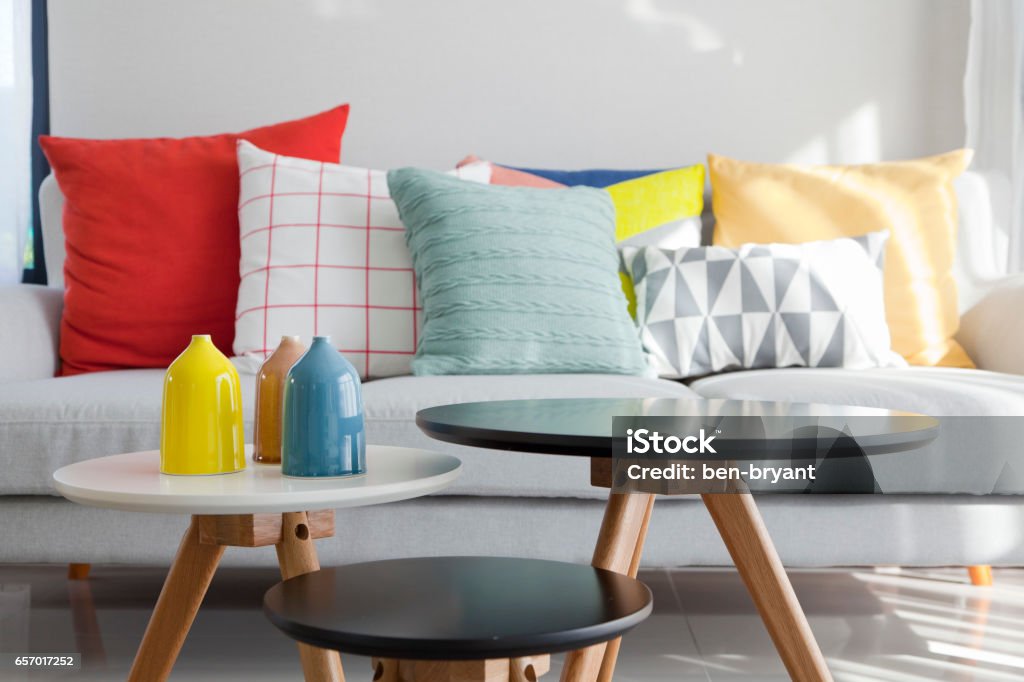 colorful cushion on sofa Gray sofa with many colorful pillows on it in livingroom Cushion Stock Photo