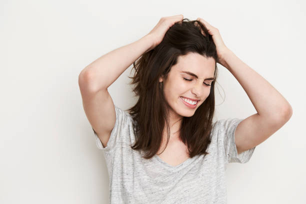 istock Hand in hair brunette 657025230