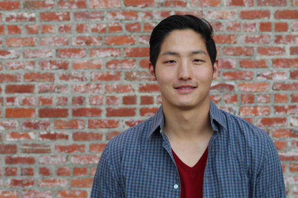 istock Asian Man Portrait Smiling Isolated 657025424