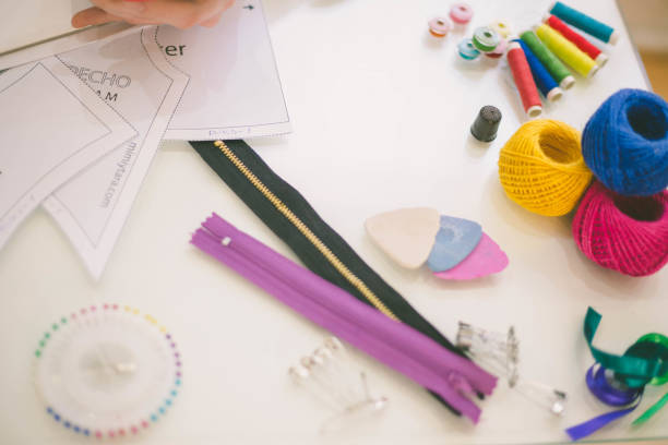 istock seamstress drawing templates in tracing paper 657027794