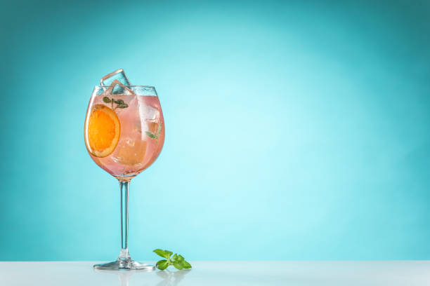 istock The rose exotic cocktail and fruit on blue 657028606