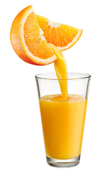 istock Fresh juice pours from orange fruit into the glass isolated on white background. 657042214