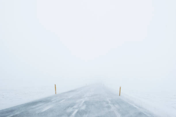 istock Winter Blizzard in the driving road in Iceland 657042716
