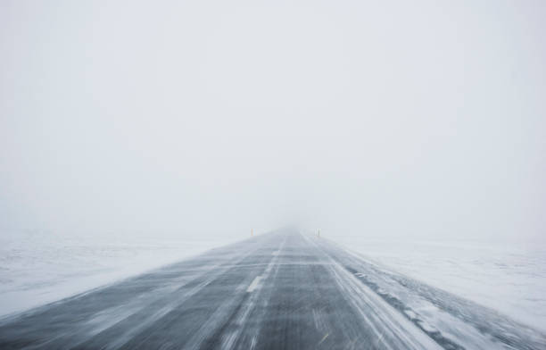 Winter Blizzard in the driving road in Iceland stock photo