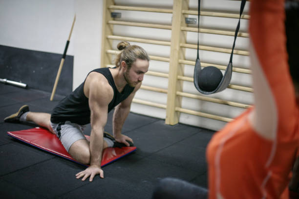 istock Two man working out in the gym. 657045596