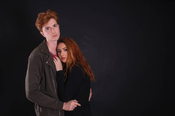 istock Retro red haired couple posing in the studio 657045674