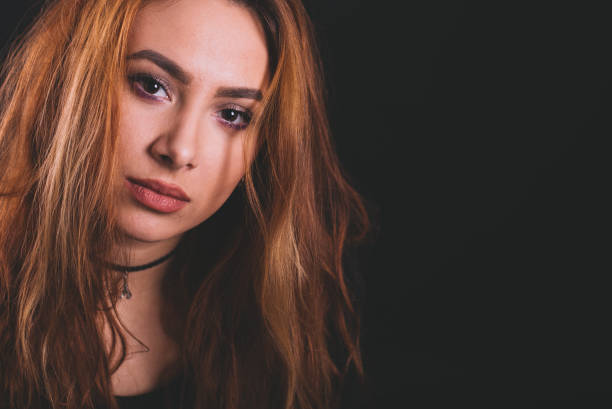 istock Studio portrait of a beautiful red haired girl 657046332