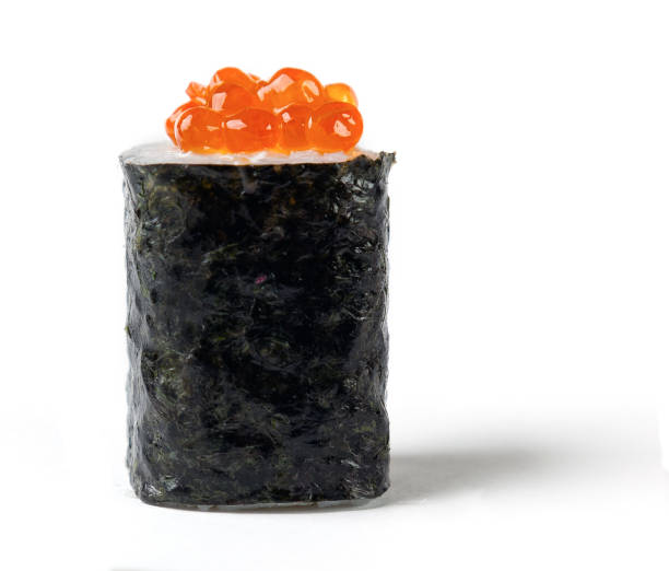 Roll with a salmon caviar Vertical roll with a salmon caviar maki sushi stock pictures, royalty-free photos & images