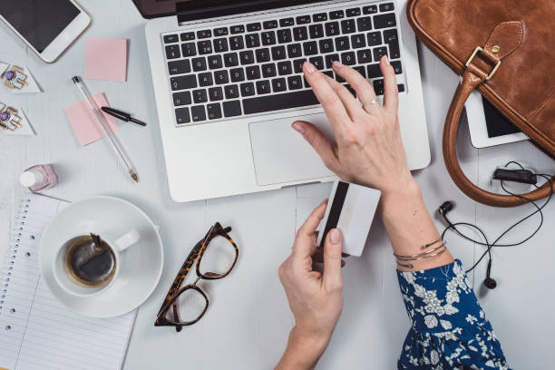istock Overhead Business Angles woman at office desk 657059510