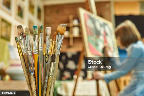 Girl Painting A Picture In Art Workshop Stock Photo - Download Image Now - Easel, Painting - Art Product, Artist