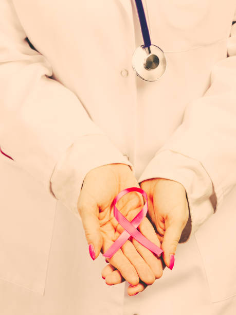 istock Female hands with pink ribbon 657066756