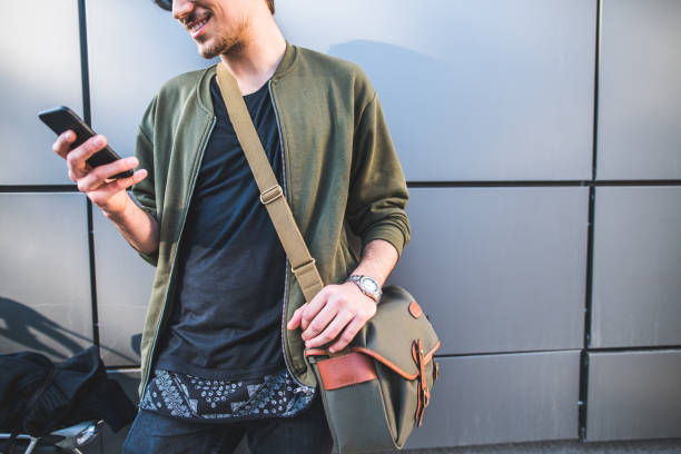 istock Close up of hipster man texting 657073460