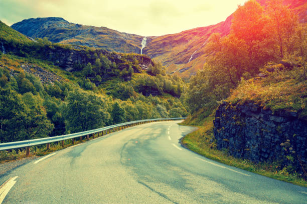 istock Mountain road at sunset. Nature Norway 657083354