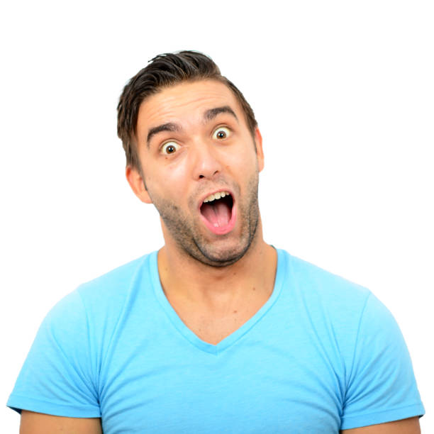 istock Portrait of man with funny face against white background 657083876