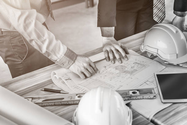 istock architect and engineer meeting concept with laptop  and documents 657087442