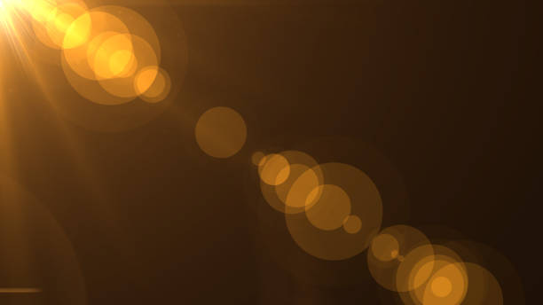 istock Lens flare  light over black background. easy to add overlay or screen filter over Photos 657090408