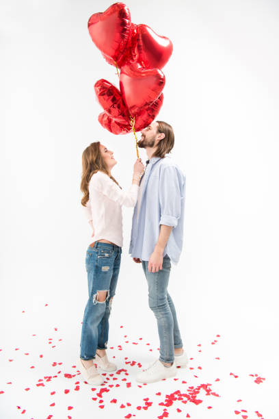 istock Couple with air balloons 657092294