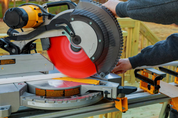 istock man cutting wood on electric saw 657093770