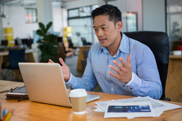 istock Frustrated business executive looking at laptop 657103132