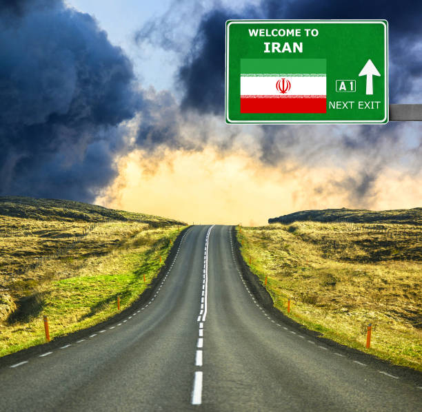 istock Iran road sign against clear blue sky 657106204