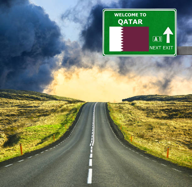 istock Qatar road sign against clear blue sky 657106522