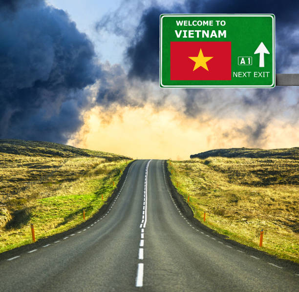 Vietnam road sign against clear blue sky