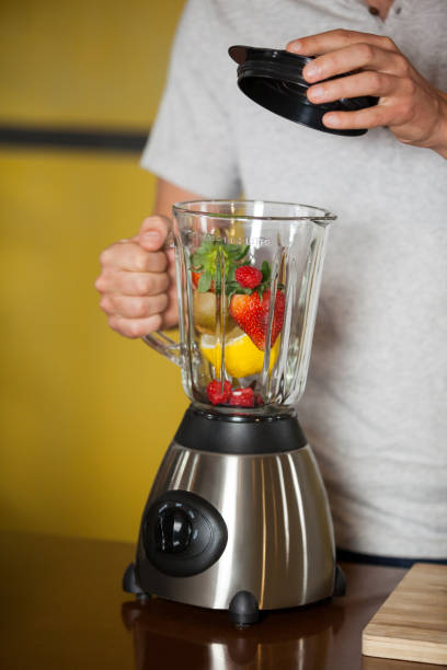 istock Male staff preparing a juice 657107622