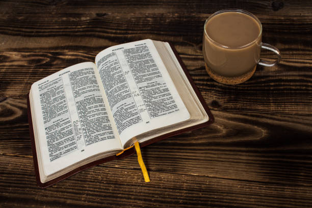 istock bible and coffee with milk on wooden background 657116550