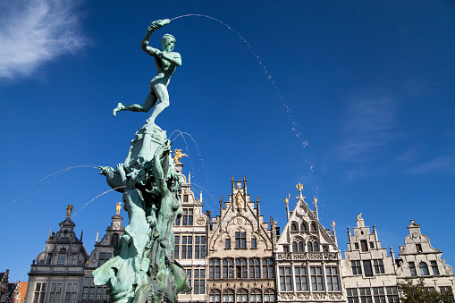 Brabo fountain and guildhalls in Antwerp, Belgium.