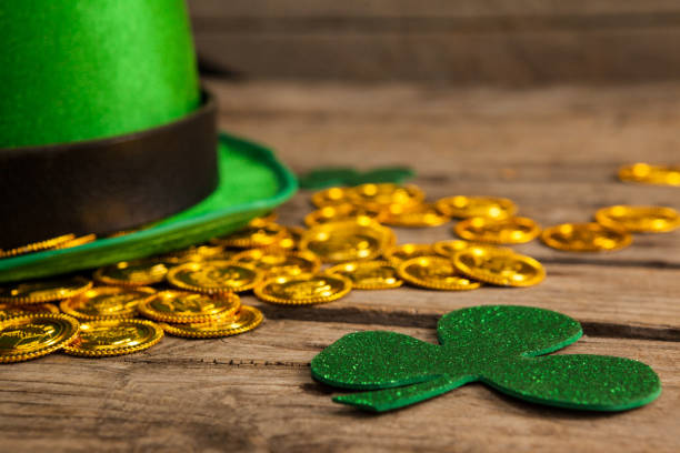 istock St Patricks Day leprechaun hat with shamrock and gold chocolate coin 657125628