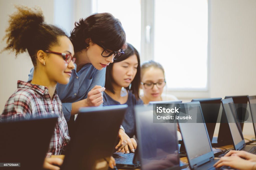 Learning Female Female Students Learning Computer Programming With Teacher Stock Photo ...