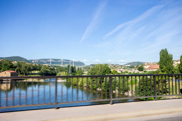 istock The Millau Viaduct, shown in the background of this panoramic view, a cable-stayed bridge that spans the valley of the River Tarn near Millau in southern France. It is the tallest bridge in the world with one mast's summit at 343 m. 657125870