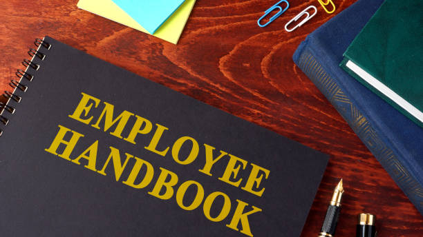 employee handbook or manual in an office. - occupation handbook human resources recruitment imagens e fotografias de stock