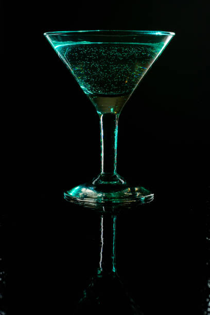 istock Glass shined with colored light on a black background. 657146718