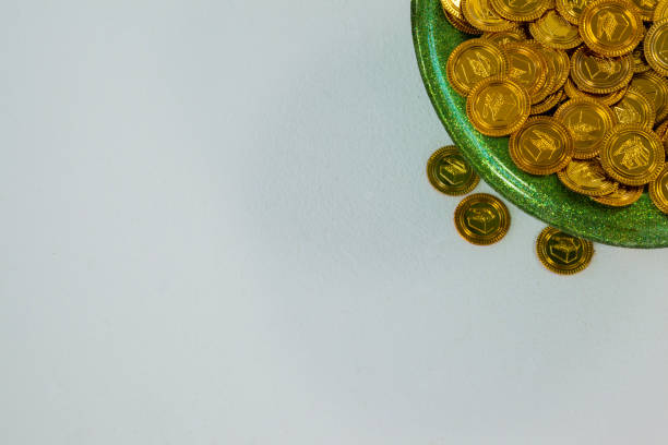 istock St. Patricks Day leprechaun hat filled with chocolate gold coins 657146844