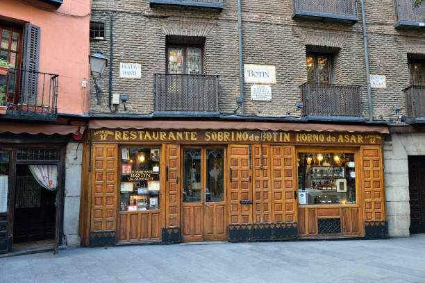 Restaurant Botin MADRID, SPAIN - MAR 03, 2014: Sobrino de Botin (Calle de los Cuchilleros, 17) - is oldest restaurant in world (1725), was founded by a french man Jean Botin. Ernest Hemingway, in his travels to Spain often visited Botin pope john paul ii stock pictures, royalty-free photos & images