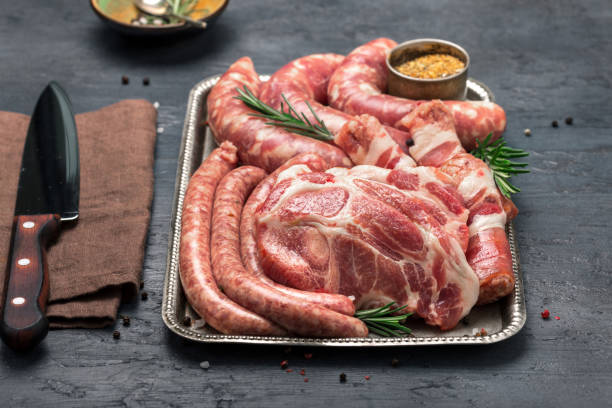 istock Set of different meat products on an iron tray on a dark surface 657147898