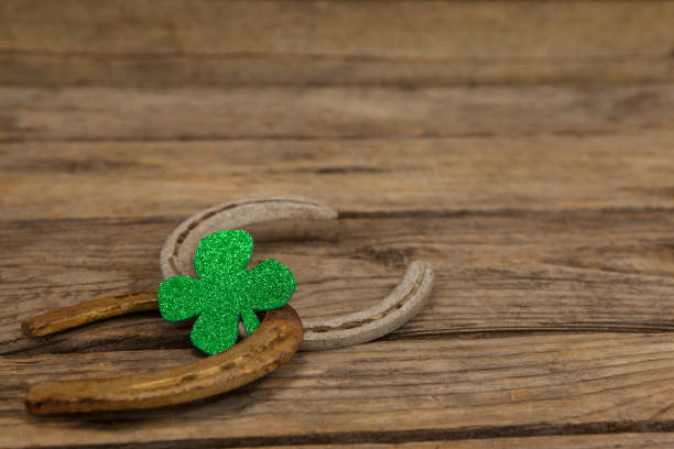 istock St Patricks Day shamrock with two horseshoes 657148146