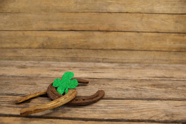istock St Patricks Day shamrock with two horseshoes 657148238