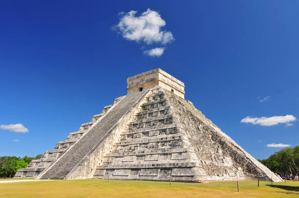 Chichen Itza, ruins el Castillo in Mexico. Temple of Kukulkan "El Castillo" step pyramid in Chichen Itza Mexico one of the New Seven Wonders of the World and UNESCO World Heritage Site. archaelogy stock pictures, royalty-free photos & images