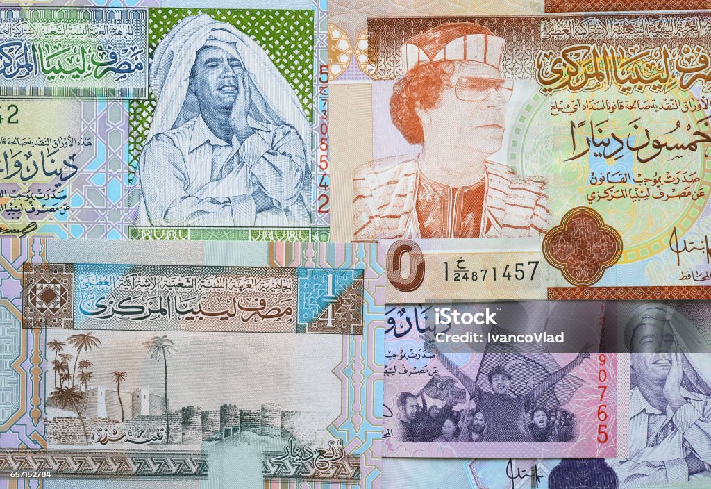 Concept: Arab spring. Muammar Gaddafi on Libya 50 dinar (2008) banknote Concept: Arab spring. Muammar Gaddafi on Libya 50 dinar (2008) banknote close up Libya Stock Photo