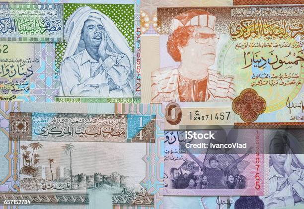 Concept Arab Spring Muammar Gaddafi On Libya 50 Dinar Banknote Stock Photo - Download Image Now