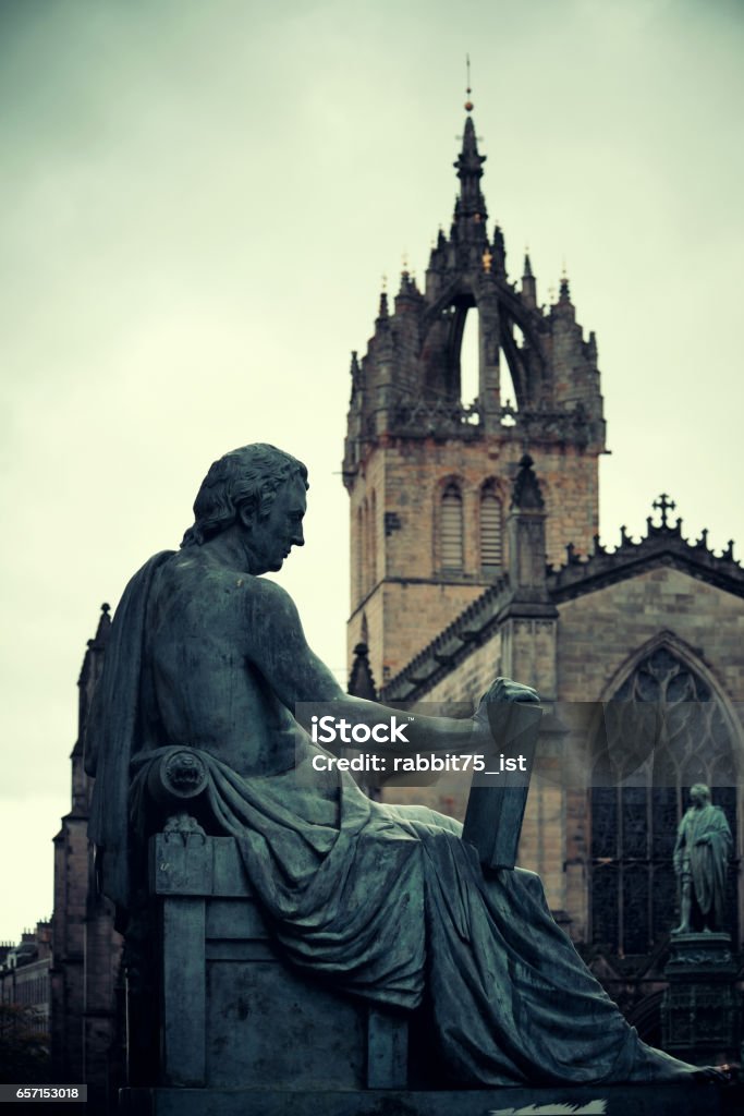 St Giles' Cathedral St Giles' Cathedral with David Hume statue as the famous landmark of Edinburgh. United Kingdom. David Hume - Philosopher Stock Photo