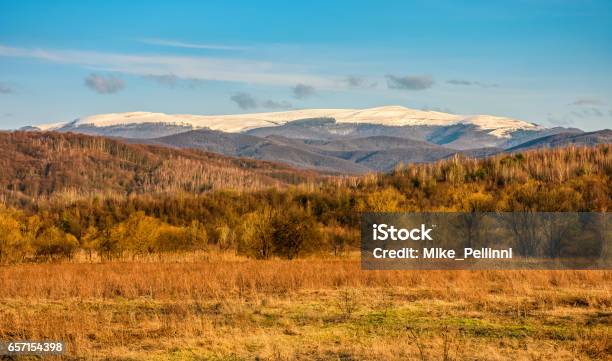 Snowy Peaks On The Mountai Top Stock Photo - Download Image Now - Awe, Beauty, Cloud - Sky